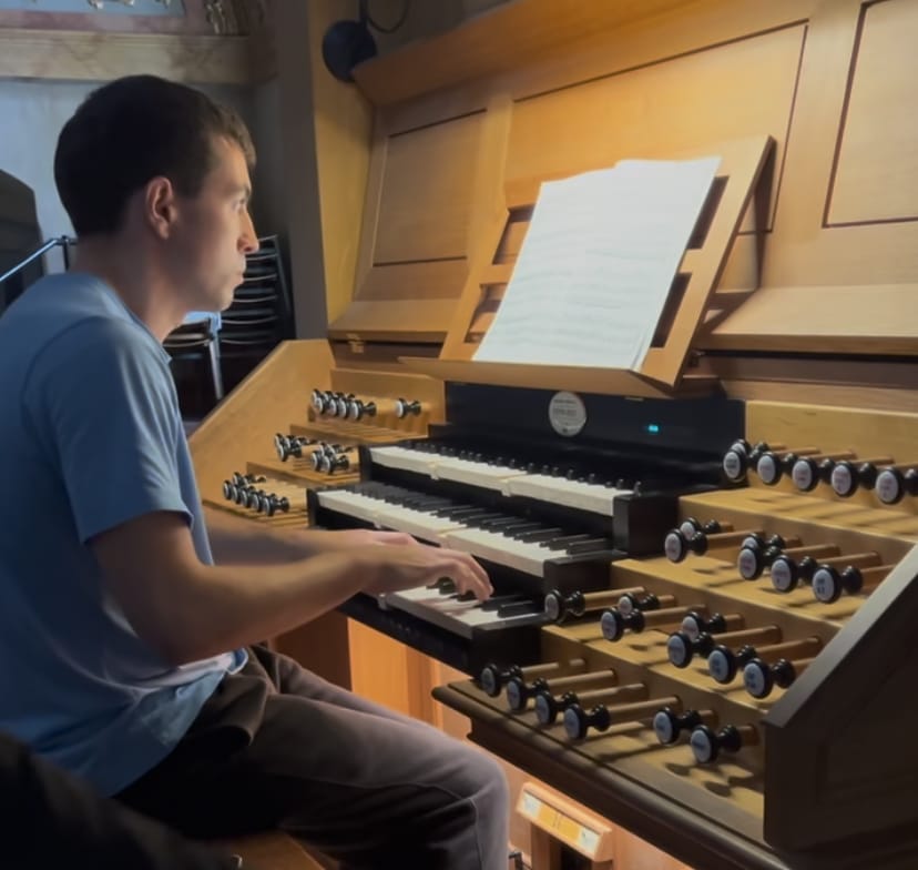Playing the organ at the Jesuit Church, Vienna